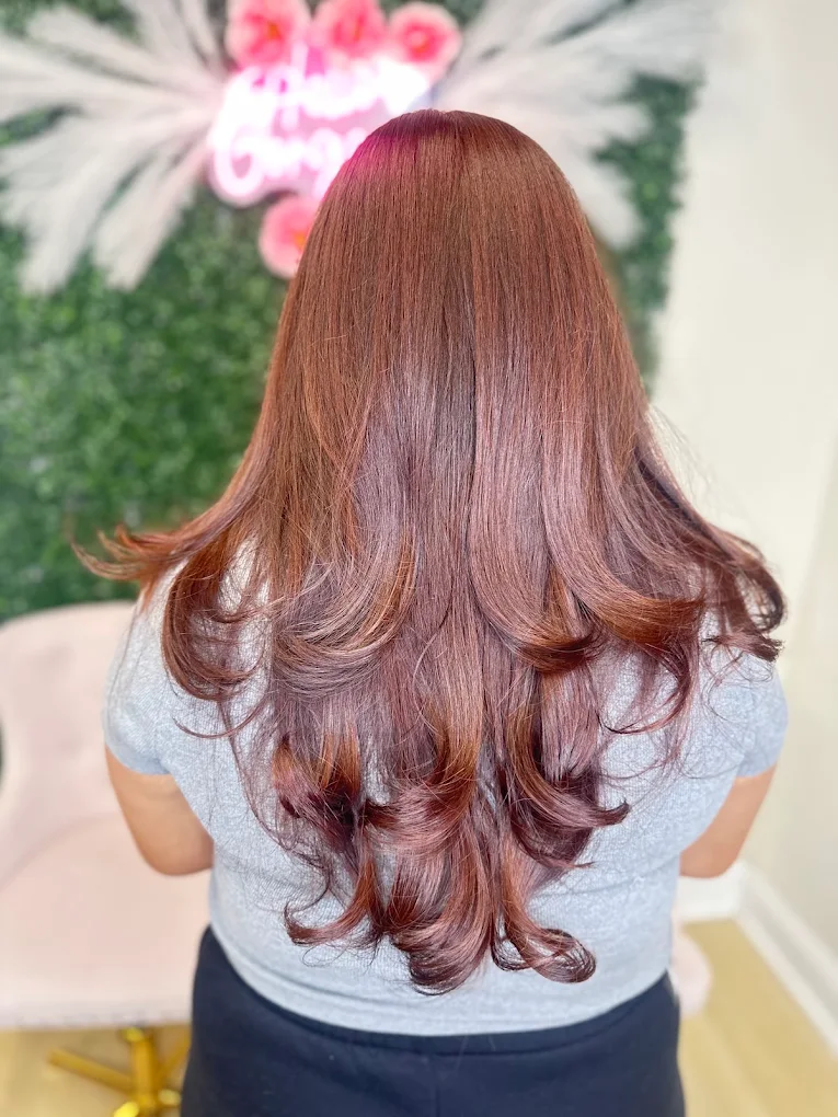 Auburn Dominican blowout with bouncy curled ends at Caribbean Queen, Charlotte NC